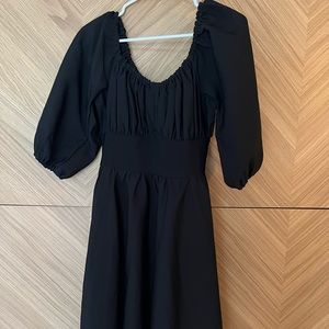 Vixen by Micheline Pitt black vacation dress